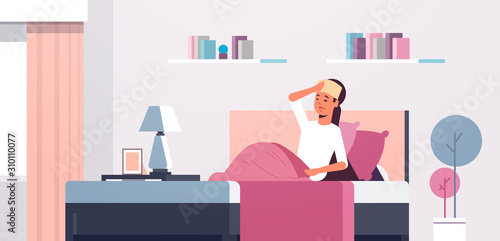 sick woman with wet towel on forehead unhealthy girl reducing high fever suffering from cold flu virus lying on bed illness concept modern living room interior flat full length horizontal vector