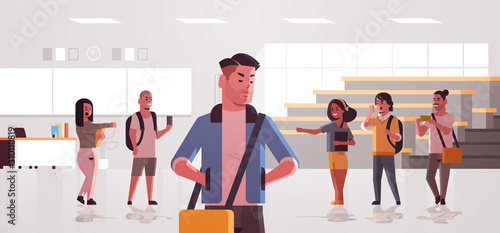 male student being bullied by classmates mix race teenagers mocking guy violence bullying social anxiety concept modern university auditory interior flat horizontal vector illustration