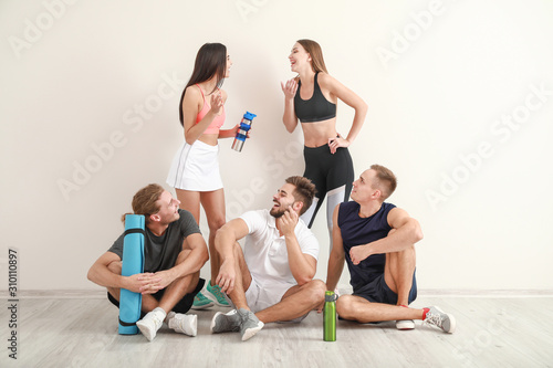 Group of sporty friends nea...