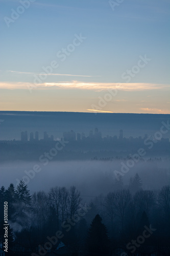 Clear sky above Metrotown covered with thick fog