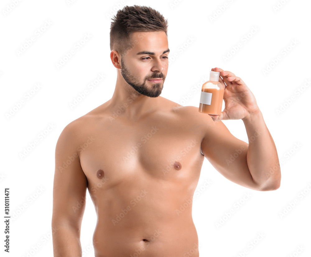 Handsome young man with cosmetic product on white background Handsome young man with cosmetic product on white background