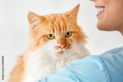 Female veterinarian with cu...