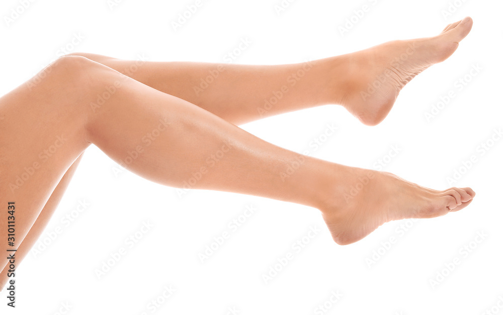 Legs of beautiful young woman on white background Legs of beautiful young woman on white background
