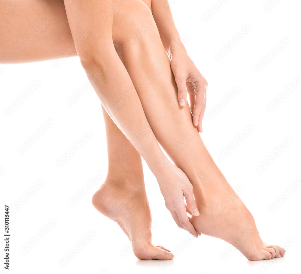 Legs of beautiful young woman on white background Legs of beautiful young woman on white background