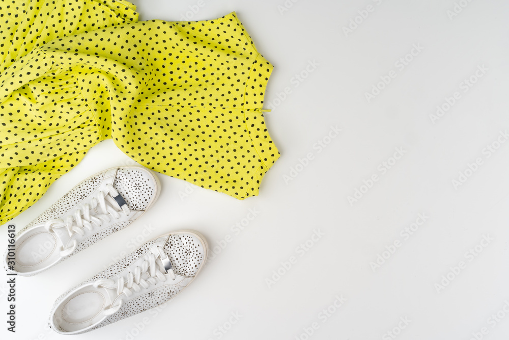 Fototapeta premium Flat lay of woman summer outfit on white background