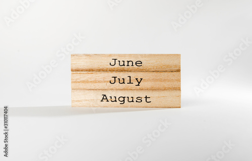 summer month wooden blocks isolated
