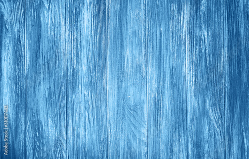 Old wooden background toned classic blue color