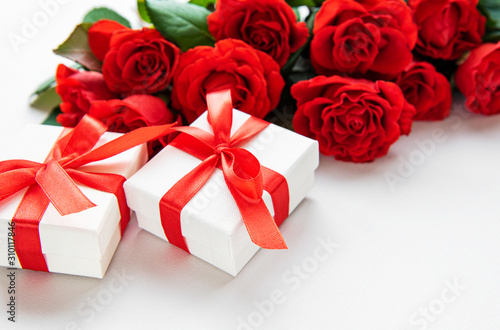 Red roses and gift boxes