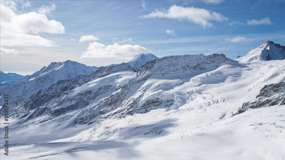Time lapse video of Jungfrau with blue nice sky in Switzerland Time lapse video of Jungfrau with blue nice sky in Switzerland