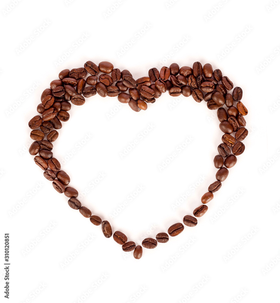 Heart shape of roasted coffee beans isolated on a white background. Heart shape of roasted coffee beans isolated on a white background.