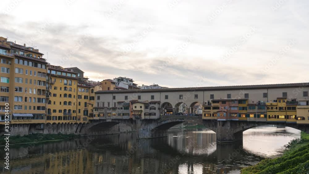 Ponte Vecchio with Arno River in Florence, Italy Ponte Vecchio with Arno River in Florence, Italy
