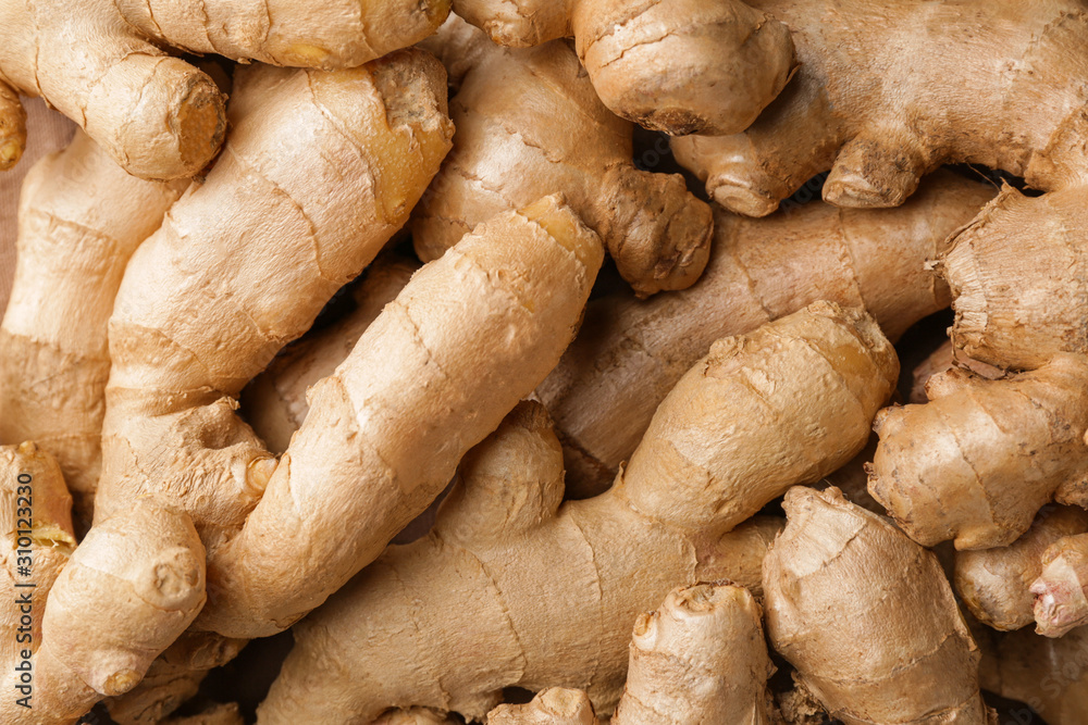 Fresh raw ginger as background Fresh raw ginger as background