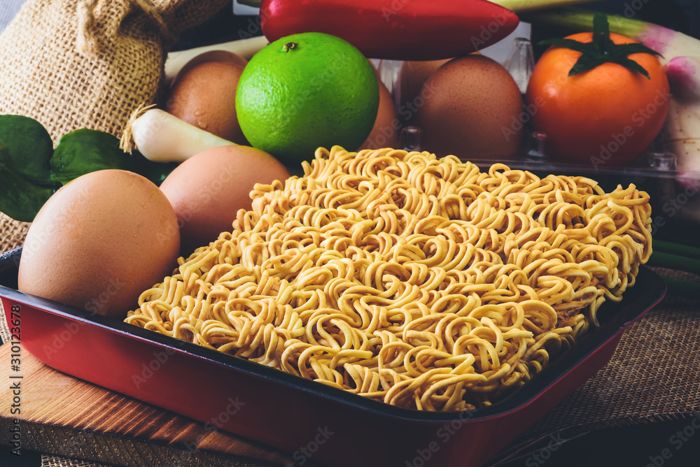 Instant noodles that are flavored with ingredients and fast food.