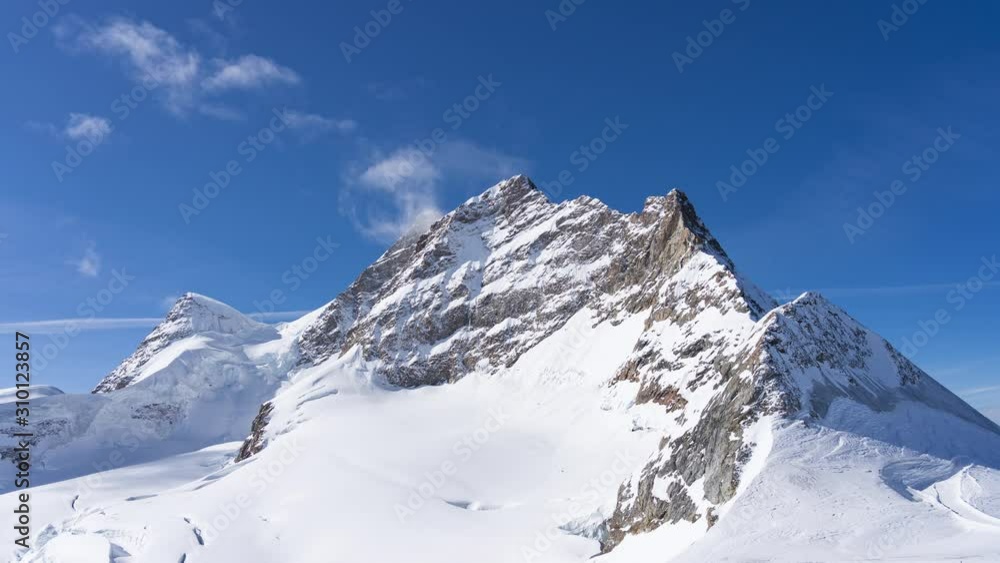 Time lapse video of Jungfrau with blue nice sky in Switzerland Time lapse video of Jungfrau with blue nice sky in Switzerland