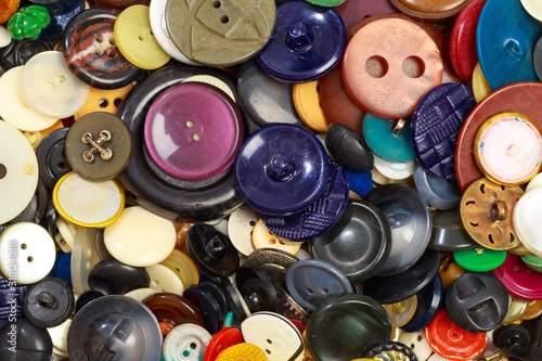 collection of various colored buttons background .