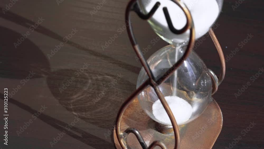 Sandglass clock closeup. Time concept Sandglass clock closeup. Time concept