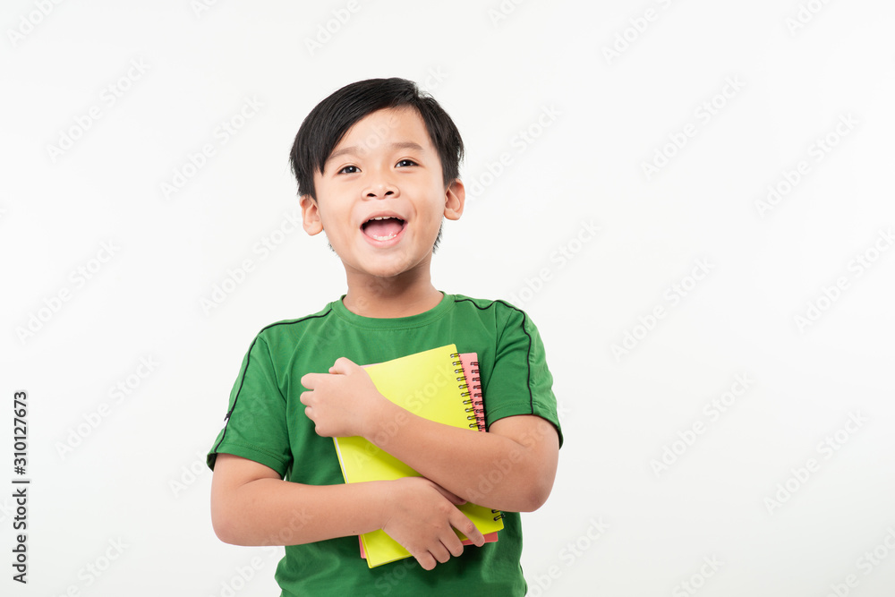Young boy with books on the white background Young boy with books on the white background