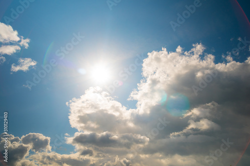 Sun and white clouds
