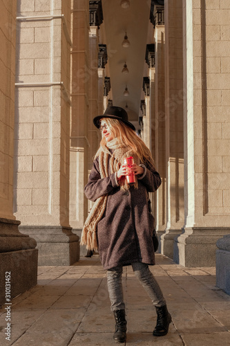 Portrait of a woman in autumn clothes. Winter and autumn trend.