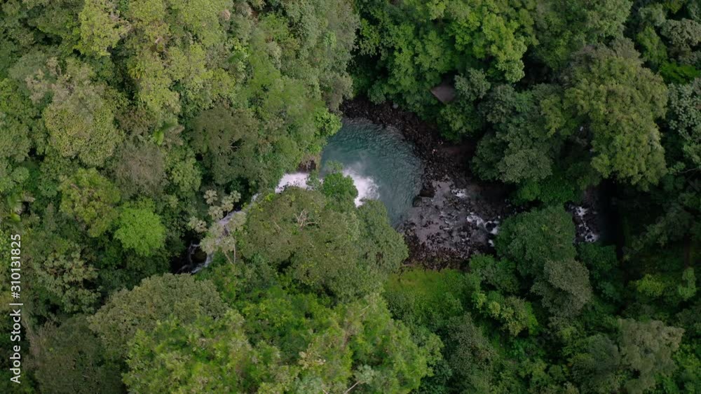 Circling Around the La Fortuna Waterfall in Alajuela, Costa Rica.
Top Down View 4K Aerial Drone Shot with Mavic Pro UHD Camera Circling Around the La Fortuna Waterfall in Alajuela, Costa Rica.
Top Down View 4K Aerial Drone Shot with Mavic Pro UHD Camera