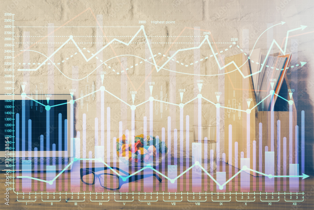 Double exposure of chart and financial info and work space with computer background. Concept of international online trading. Double exposure of chart and financial info and work space with computer background. Concept of international online trading.