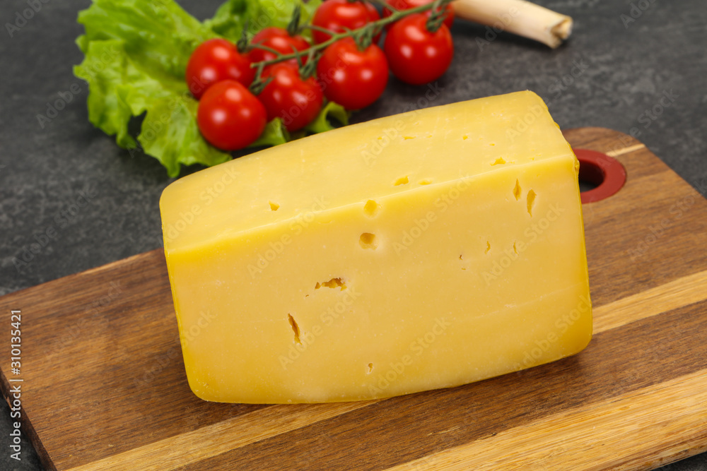 Hard yellow tasty cheese brick Hard yellow tasty cheese brick