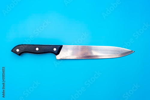 Fotografie, Obraz Large knife on blue background