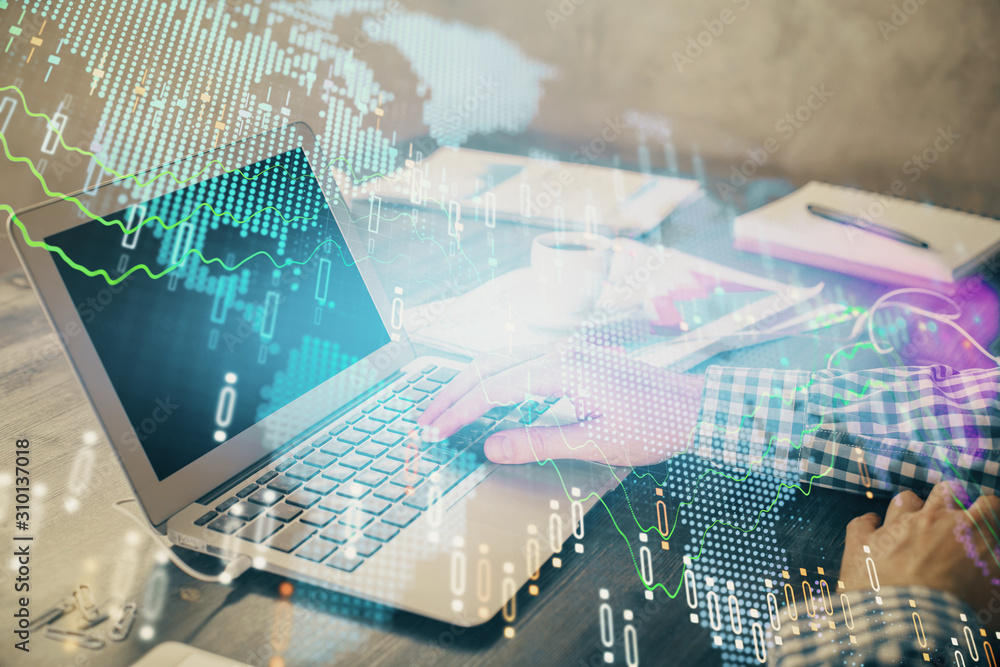 Double exposure of forex chart with man working on computer on background. Concept of market analysis. Double exposure of forex chart with man working on computer on background. Concept of market analysis.