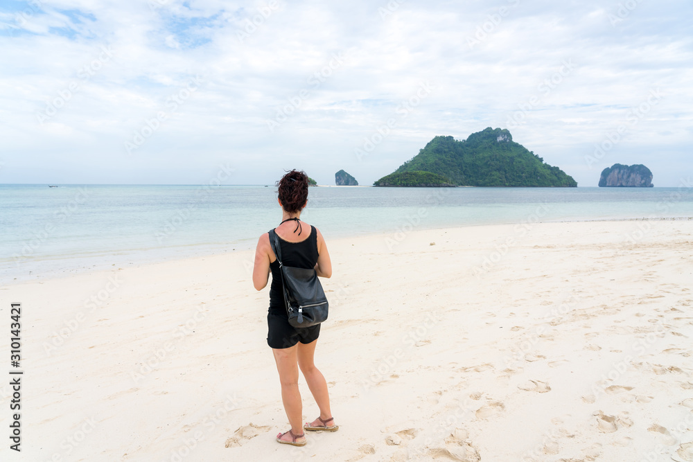 young cute hipster girl travelling at beautiful blue sky paradise tropical  coast beach PP Island Krabi Phuket Thailand guiding idea for long weekend  female relax rest woman women planning life