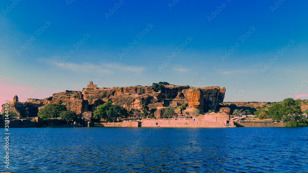 On the sidewalks of this lake found an potrait resembling or pretended to be a ship to my eyes.......Place : Badami, Karnataka