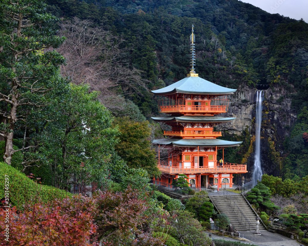 Wakayama, Japan - November 23, 2019: Beautiful view of Nachisan Seigantoji temple and Nachi no Taki waterfall at Nachi Katsuura Town Wakayama, Japan - November 23, 2019: Beautiful view of Nachisan Seigantoji temple and Nachi no Taki waterfall at Nachi Katsuura Town