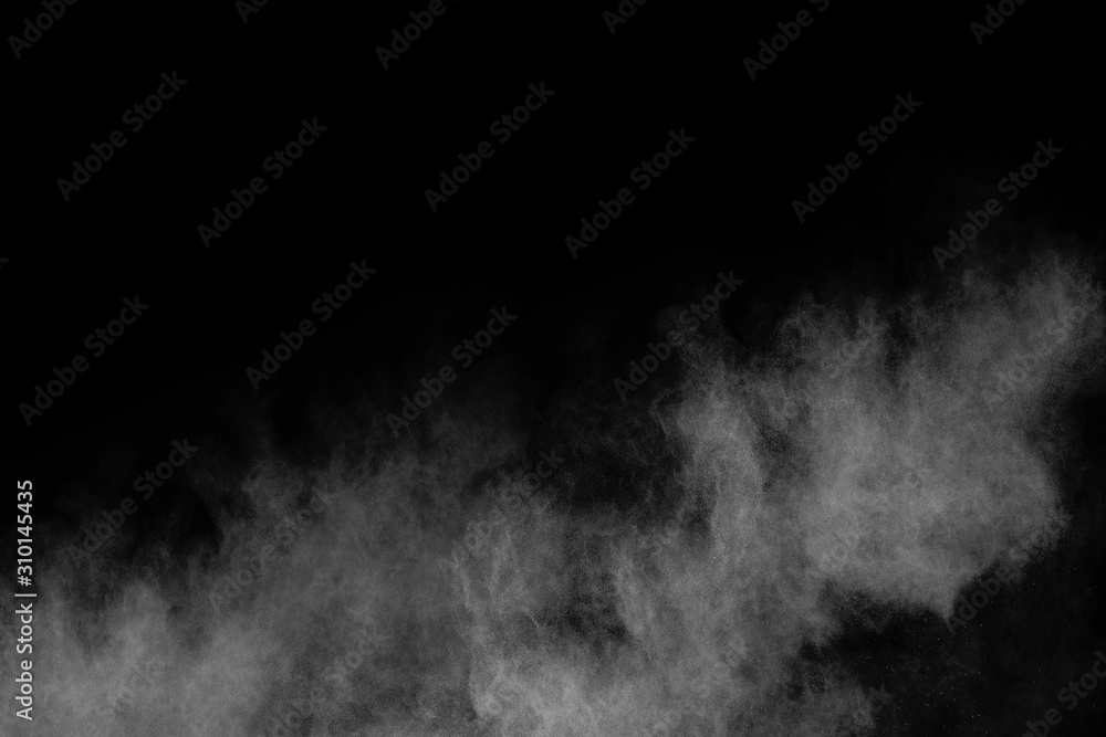 White powder explosion on black background. White powder explosion on black background.