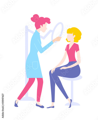 Medical procedure dermatoscopy. A dermatologist or cosmetologist examines a patients skin.
