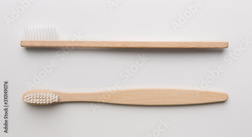 Eco natural bamboo toothbrushes on white background