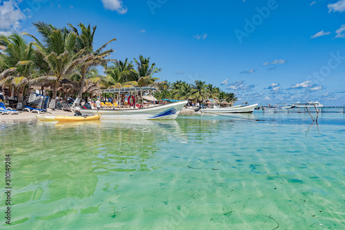 Panoramic of beach, water, boats and ships
