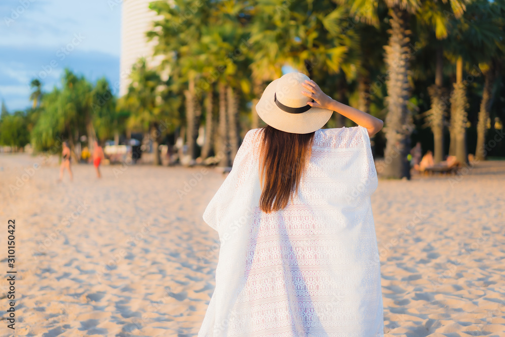 Portrait beautiful young asian women happy smile relax around beach sea ocean