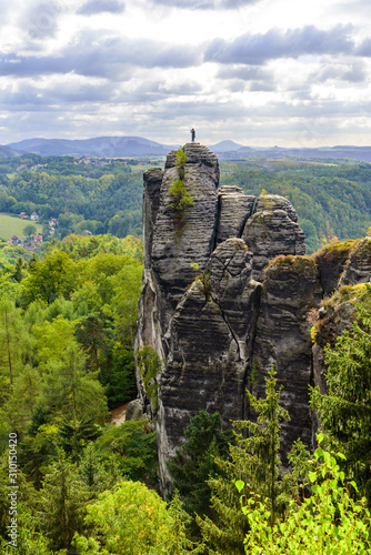 Bastei Rocks in Swiss Saxony, beautiful landscape scenery around the ruins of Neurathen Castle, Elbe Sandstone Mountains in Saxon Switzerland, Germany, Europe. photo