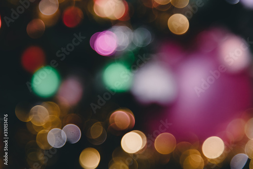 Abstract circle bokeh light background with decorations in holiday of Christmas. © wirat