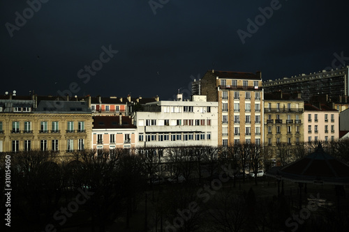 Paris building with sunshine in cloudy day