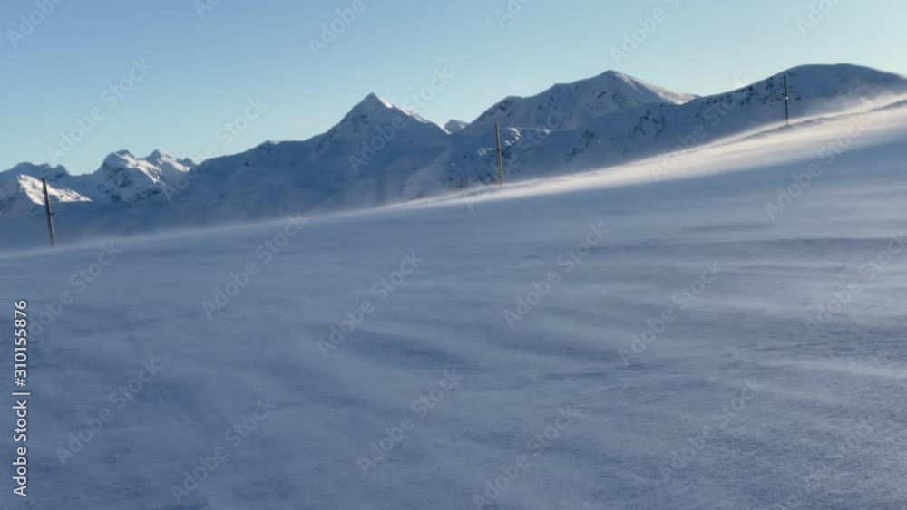 Windy mountains top with snow in winter Windy mountains top with snow in winter