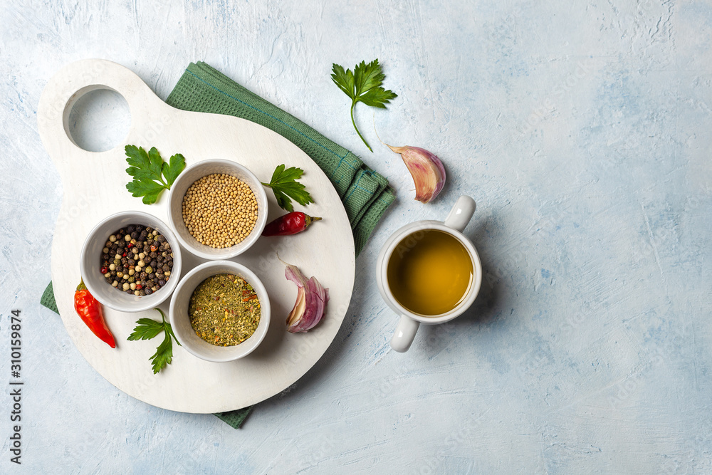 Set of fragrant spices on a wooden white Board. Pepper, mustard seeds, herbs Set of fragrant spices on a wooden white Board. Pepper, mustard seeds, herbs