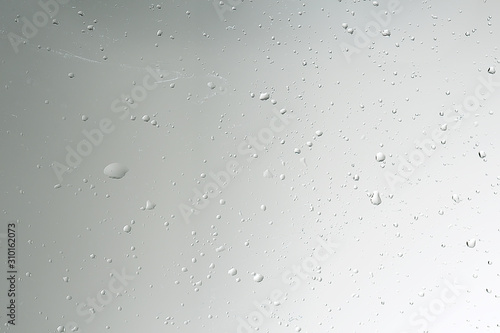 wet glass background condensate   abstract rain  drops texture on transparent glass