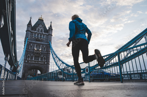 Canvas Print Morning run on Tower Bridge in London, UK.
