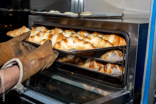 Freshly baked croissants in a bakery in Madrid, Spain