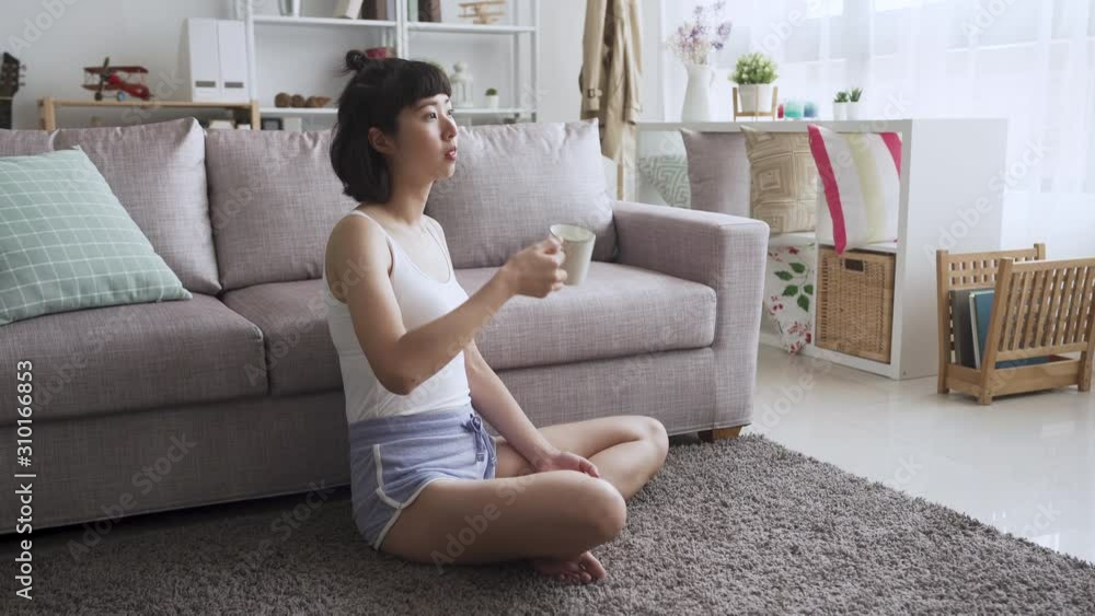 girl in early morning drinking cup of tea girl in early morning drinking cup of tea