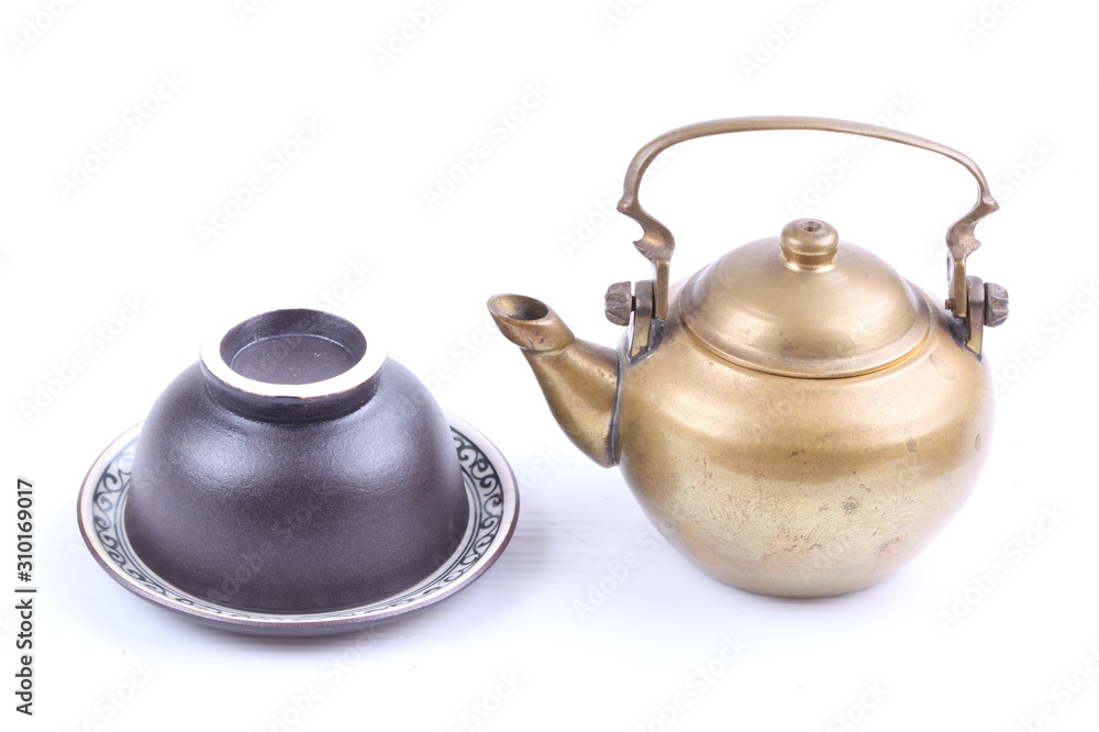 set of Ancient teapot,Teacup and Saucer on white background