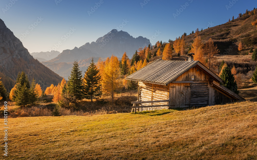 Bridge to the colors of autumn. Passo Falzarego Bridge to the colors of autumn. Passo Falzarego