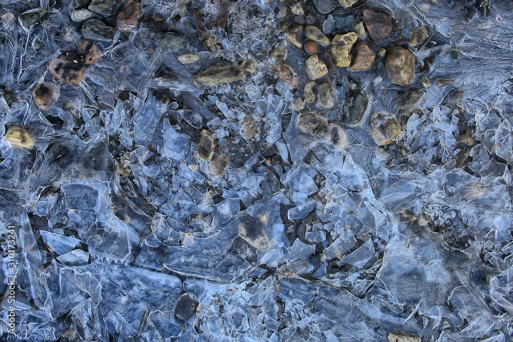 cracked ice texture, abstract seasonal winter cold background, natural ice, broken ice on a lake cracked ice texture, abstract seasonal winter cold background, natural ice, broken ice on a lake