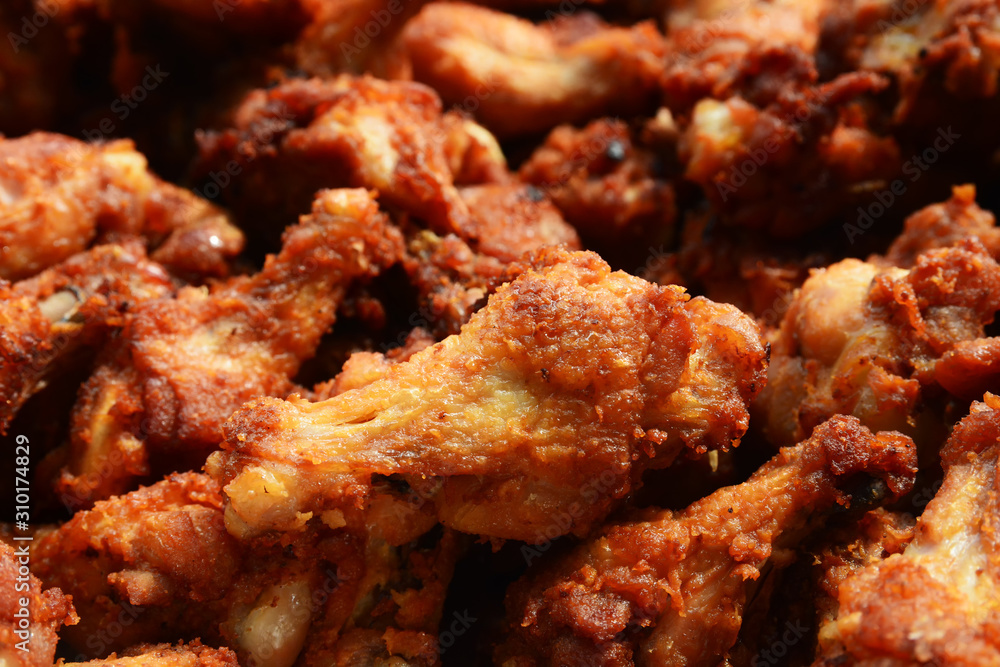 Fried chicken wing or Fried chicken on a plate in thai food style Fried chicken wing or Fried chicken on a plate in thai food style