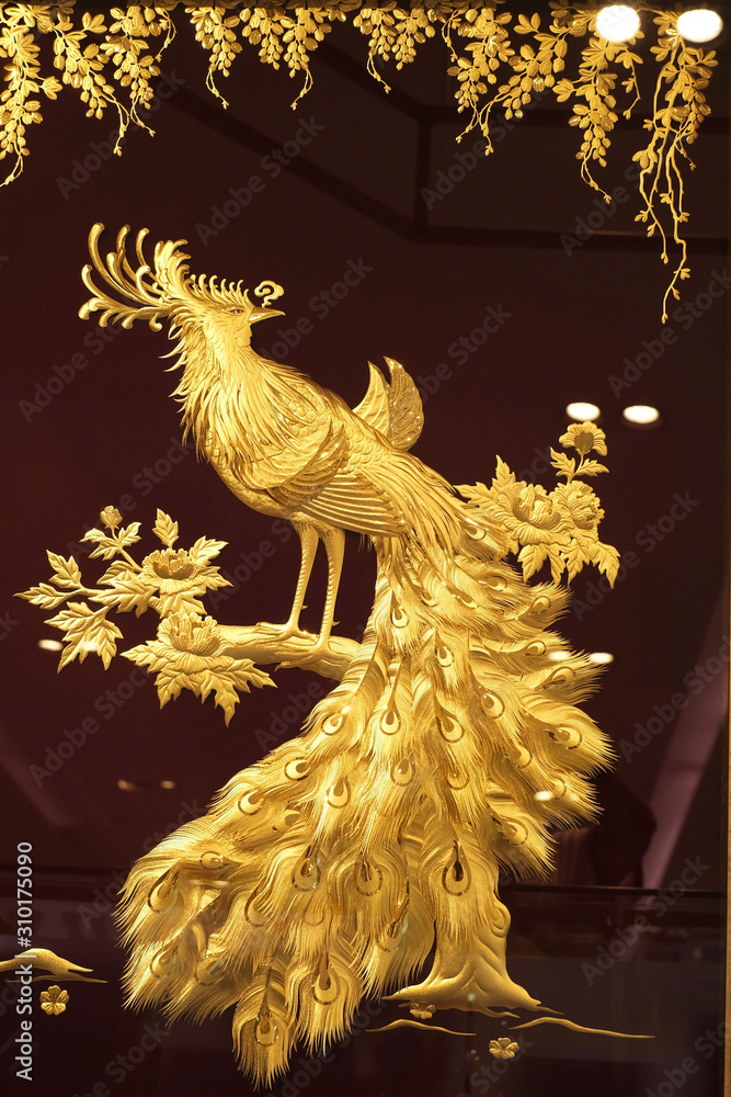 Fototapeta premium Real gold peacock image in frame